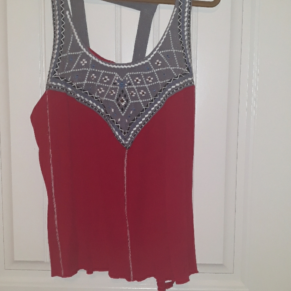 Maurice's red flowing tank